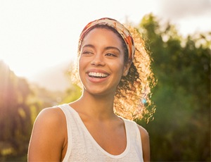 Woman smiling outside