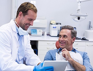 Man at the dentist for a dental crown in Carrollton