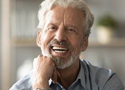 Man smiling with dentures