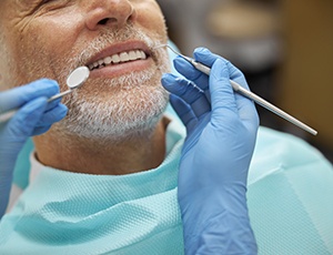 a man receiving a dental exam