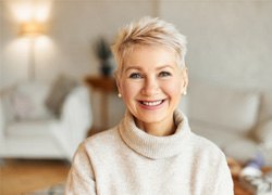 Woman smiling in living room
