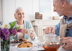 elderly couple sharing a meal