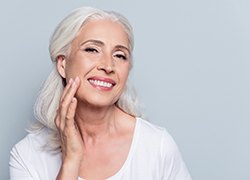 elderly woman showing off her smile