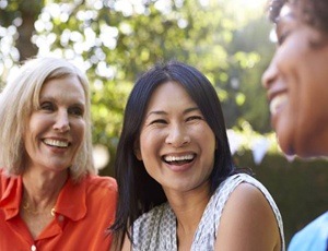 group of woman laughing together