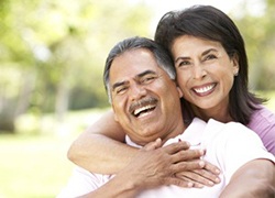 happy elderly couple in a park