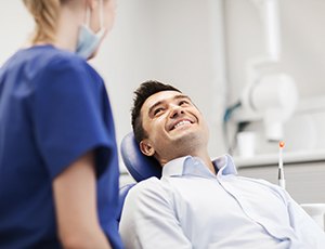 Patient shaking hands with Saturday dentist