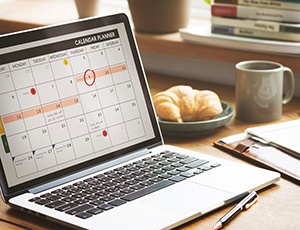 Patient in Carrollton scheduling a dental appointment online