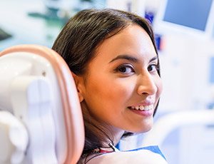 Smiling woman in dental chair