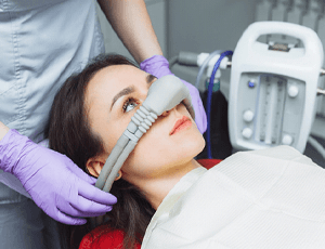 A patient receiving care from a sedation dentist in Carrolton