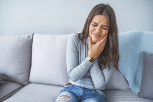 Woman experiencing severe toothache
