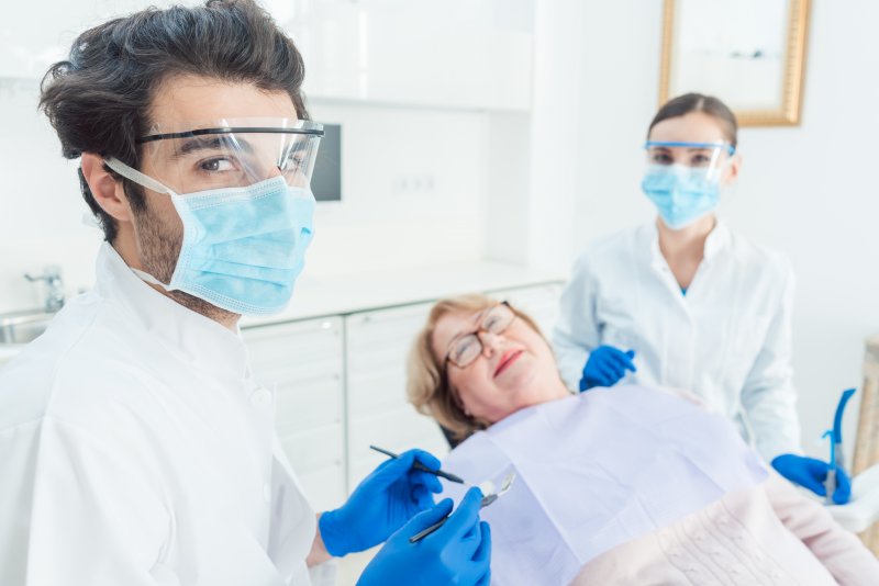 Dentist in Carrollton wearing PPE