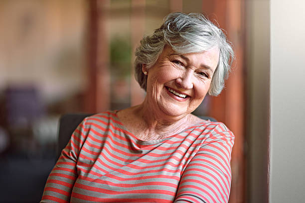 older person with dentures smiling 