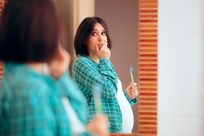 Pregnant patient gasping due to pregnancy gingivitis