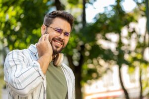 Man experiencing tooth pain